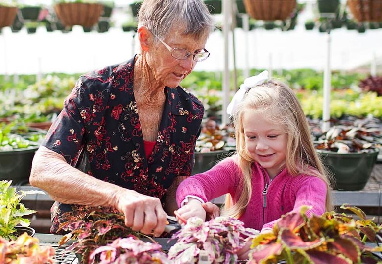 Fairview Garden Center grandmother helping grandaughter