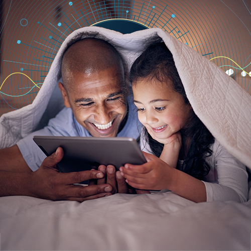 Dad and daughter around an iPad with internet graphic surrounding them